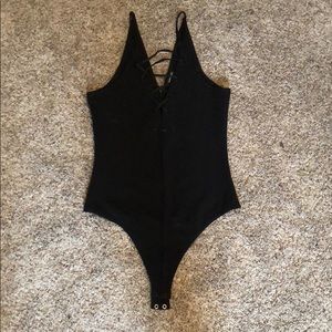 ON HOLD - Criss cross Bodysuit